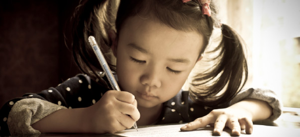 little girl writing.jpg